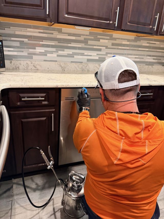 Pest Control Tech With Dishwasher 640
