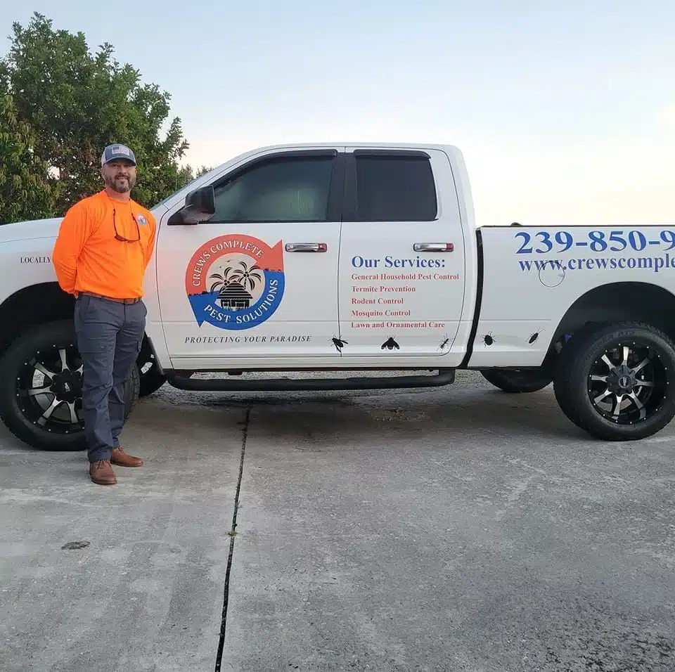 Crews Complete Pest Solutions owner with service truck in Fort Myers Crews Complete Pest Solutions owner with service truck in Fort Myers